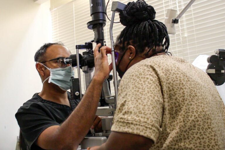 Dr. Shetty examines the eye of a glaucoma patient who had the XEN Gel Stent