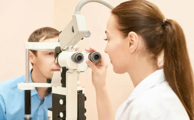 Doctor examining a patient's eyes