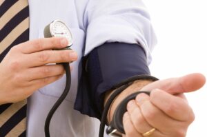 man taking his blood pressure