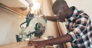 Man Using Woodworking Machine