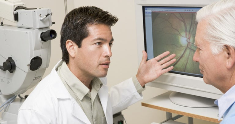 Ophthalmologist with Patient | Florida Eye Specialists