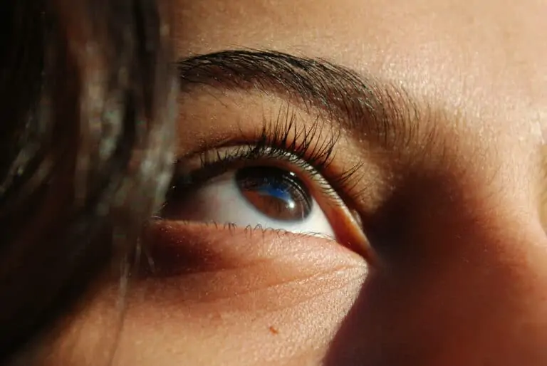 Up close shot of a woman's eye in the light