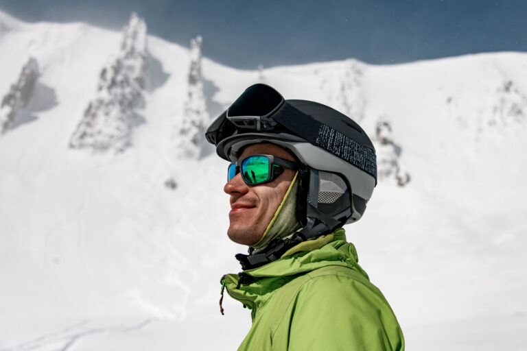 man skiing in sunglasses